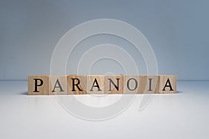 Text of paranoia from wooden cubes. psychological terms and health problems