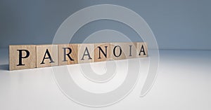 Text of paranoia from wooden cubes. psychological terms and health problems