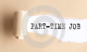 The text PART-TIME JOB appears on torn paper on white background