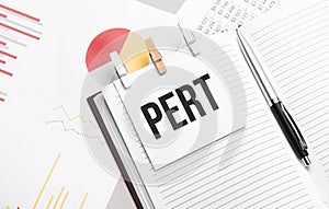 text pert on stickers on the diary with office tools