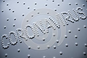 Text phrase Coronavirus sign concept made from white tablets