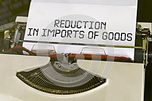 The text is printed on a typewriter - reduction in imports of goods photo