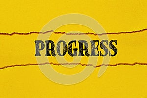 The text PROGRESS appears on torn yellow paper