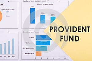 Text PROVIDENT FUND written In a yellow triangle on a white background with financial charts and graphs