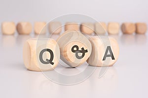 text 'q and a' - Question and Answer - on wooden blocks