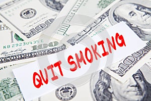 Text of quit smoking with dollars money