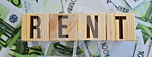 Text rent and euro banknotes closeup. Business finance rentals