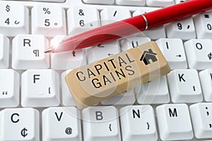 Text showing inspiration Capital Gains. Business overview Bonds Shares Stocks Profit Income Tax Investment Funds