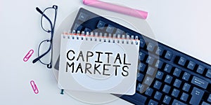 Text showing inspiration Capital Markets. Internet Concept Allow businesses to raise funds by providing market security