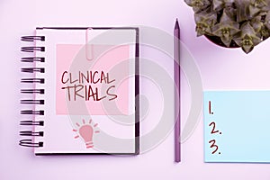 Text showing inspiration Clinical Trials. Business concept Research investigation to new treatments to people