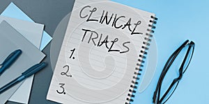 Text showing inspiration Clinical Trials. Business concept Research investigation to new treatments to people