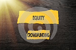 Hand writing sign Equity Crowdfunding. Business approach raising capital used by startups and earlystage company Bright photo