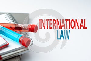 Text showing inspiration International Law. Business approach system of treaties and agreements between nations Writing