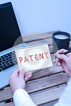 Text showing inspiration Patent. Word Written on intellectualproperty that gives owner legal right has the sole right photo