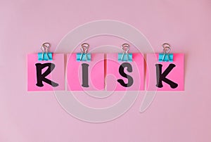 Text showing inspiration Risk on pink sticky paper