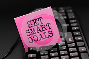 Text showing inspiration Set Smart Goals. Business approach Establish achievable objectives Make good business plans