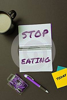 Text showing inspiration Stop Eating. Concept meaning cease the activity of putting or taking food into the mouth