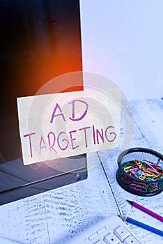 Text sign showing Ad Targeting. Conceptual photo target the most receptive audiences with certain traits Note paper taped to black