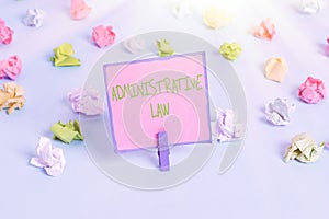 Text sign showing Administrative Law. Conceptual photo Body of Rules regulations Orders created by a government Colored crumpled