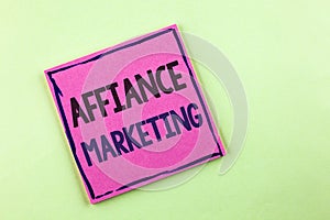 Text sign showing Affiance Marketing. Conceptual photo joining two or more companies in same field mutual goal written on Pink Sti photo