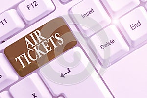 Text sign showing Air Tickets. Conceptual photo individual is entitled to a seat on a flight on an aircraft White pc