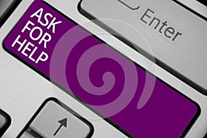 Text sign showing Ask For Help. Conceptual photo Request to support assistance needed Professional advice Keyboard purple key Inte photo