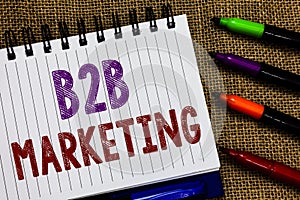 Text sign showing B2B Marketing. Conceptual photo Partnership Companies Supply Chain Merger Leads Resell Open spiral notebook page photo