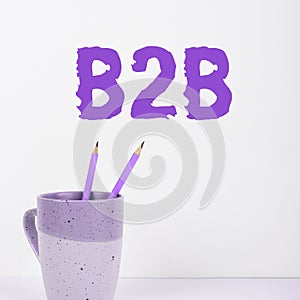 Text sign showing B2B. Concept meaning Exchange of products services information between businesses E Commerce
