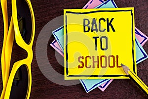 Text sign showing Back To School. Conceptual photo Right time to purchase schoolbag, pen, book, stationary written on Yellow Stick