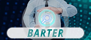 Text sign showing Barter. Business idea trade by exchanging one commodity for another goods or services