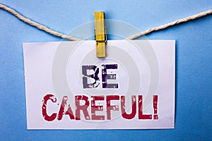 Text sign showing Be Careful. Conceptual photo Caution Warning Attention Notice Care Beware Safety Security written on White Note