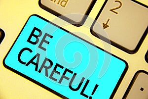 Text sign showing Be Careful. Conceptual photo making sure of avoiding potential danger mishap or harm Keyboard blue key Intention