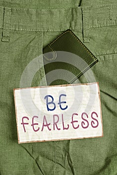 Text sign showing Be Fearless. Conceptual photo act of living in spite of those things that scare you to death Small little wallet