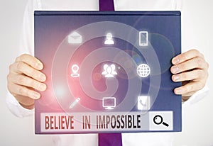 Text sign showing Believe In Impossible. Conceptual photo You can do it everything is possible Work hard Male human