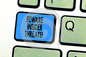 Text sign showing Beware Insider Threats. Conceptual photo Be cautious on malicious attack inside the network Keyboard