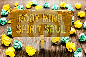 Text sign showing Body Mind Spirit Soul. Conceptual photo Personal Balance Therapy Conciousness state of mind Paperclip grip cardb