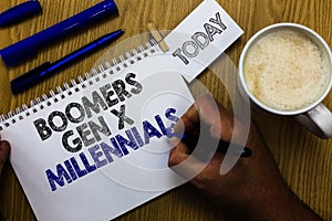 Text sign showing Boomers Gen X Millennials. Conceptual photo generally considered to be about thirty years Man holding marker not