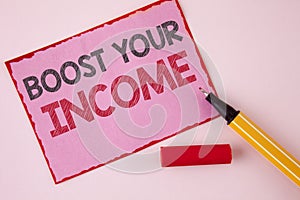 Text sign showing Boost Your Income. Conceptual photo improve your payment Freelancing Part time job Improve written on Pink Stick