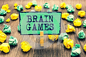 Text sign showing Brain Games. Conceptual photo psychological tactic to manipulate or intimidate with opponent Clothespin holding