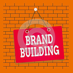 Text sign showing Brand Building. Conceptual photo activities associated with establishing and promoting a brand Colored