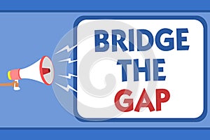 Text sign showing Bridge The Gap. Conceptual photo Overcome the obstacles Challenge Courage Empowerment Man holding megaphone loud