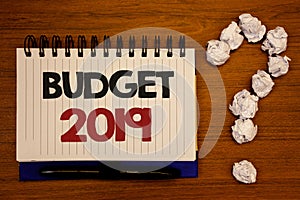 Text sign showing Budget 2019. Conceptual photos New year estimate of incomes and expenses Financial PlanIdeas on notebook wooden