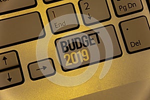 Text sign showing Budget 2019. Conceptual photos New year estimate of incomes and expenses Financial PlanKeyboard brown keys black