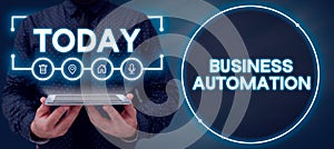 Text sign showing Business Automation. Business concept Advanced Capabilities Timely Expectations Goals Man With Tablet