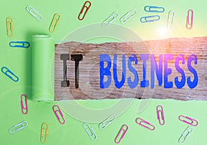 Text sign showing It Business. Conceptual photo organization uses information technology to achieve goals Paper clip and