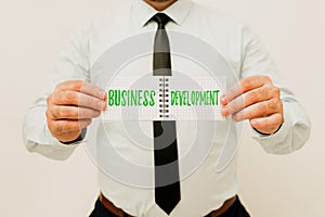 Text sign showing Business Development. Word Written on Implement Growth Value within and between company Presenting New