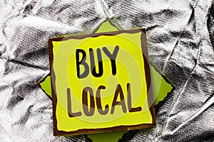 Text sign showing Buy Local. Conceptual photo Buying Purchase Locally Shop Store Market Buylocal Retailers written on Stacked Stic