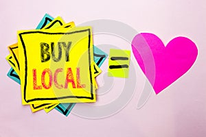 Text sign showing Buy Local. Conceptual photo Buying Purchase Locally Shop Store Market Buylocal Retailers written on Stacked Stic photo