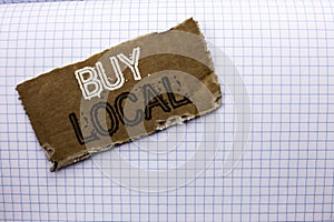 Text sign showing Buy Local. Conceptual photo Buying Purchase Locally Shop Store Market Buylocal Retailers written on tear Cardboa