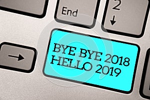 Text sign showing Bye Bye 2018 Hello 2019. Conceptual photo Starting new year Motivational message 2018 is over Silver grey comput